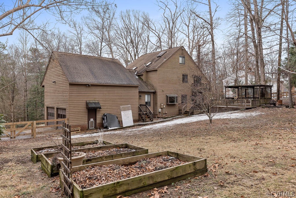 7250 Beach Road Chesterfield, VA 23832 - Photo 36 of 46 a backyard of a house with fire pit and couches