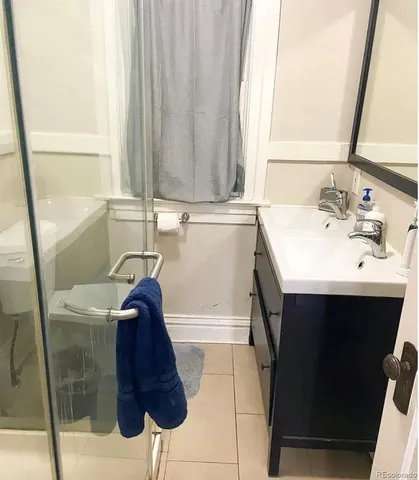 a bathroom with a sink and a bathtub