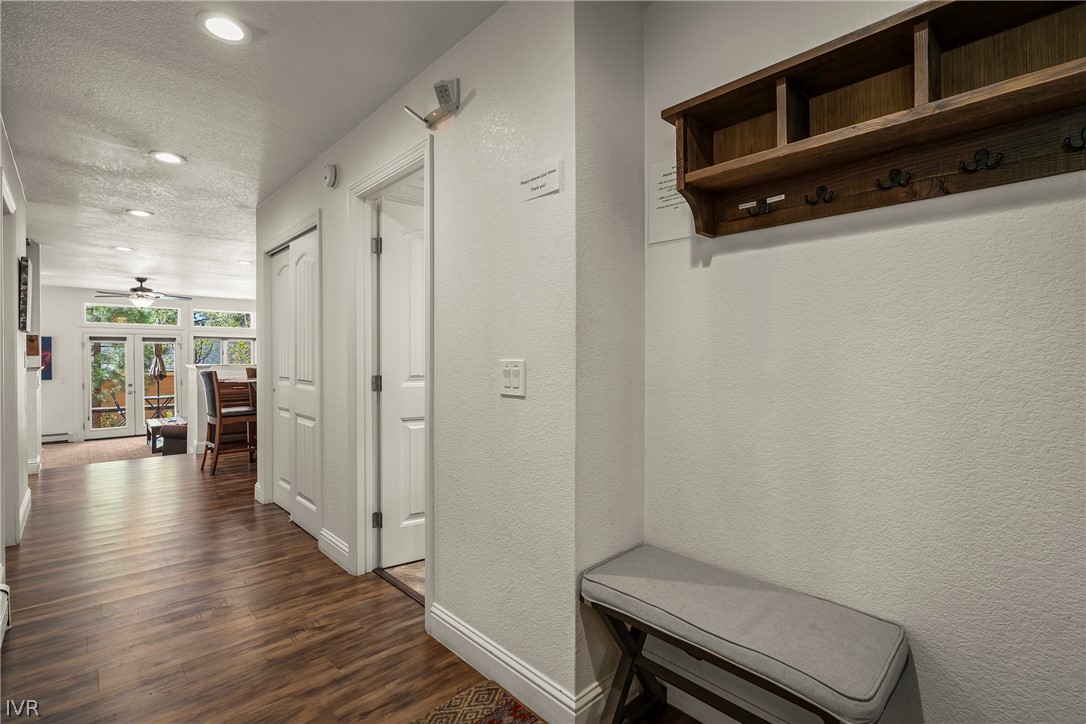 939 Incline Way, Unit 200 Incline Village, NV 89451 - Photo 2 of 27 a hallway with wooden floor