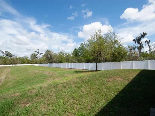 a view of a golf course with a lake
