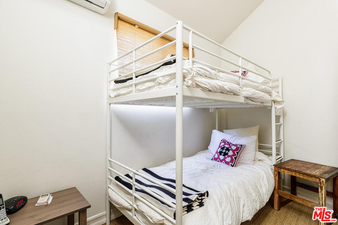 45 Paradise Cove Road Malibu, CA 90265 - Photo 11 of 15 a bedroom with a bed and a desk