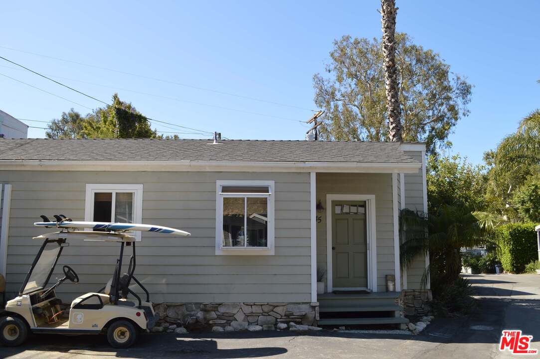 45 Paradise Cove Road Malibu, CA 90265 - Photo 14 of 15 a view of a brick house with many windows