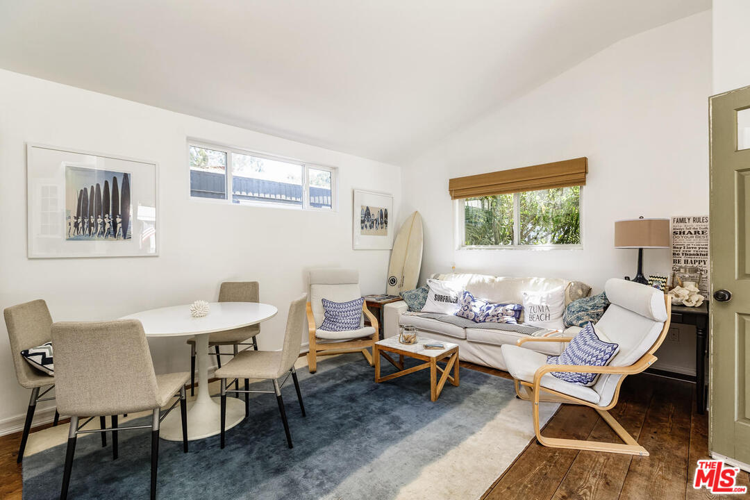 45 Paradise Cove Road Malibu, CA 90265 - Photo 4 of 15 a living room with furniture a rug and a window