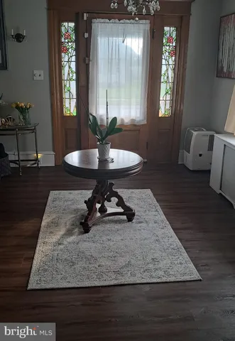 a room with furniture and window