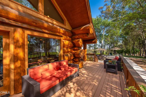 a view of a terrace with a yard