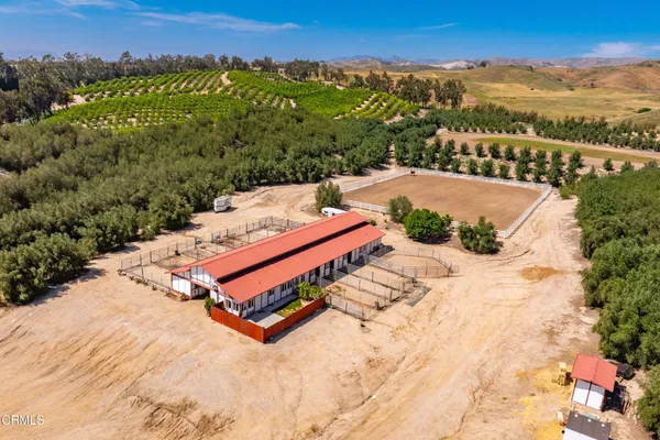 a view of a swimming pool with a yard