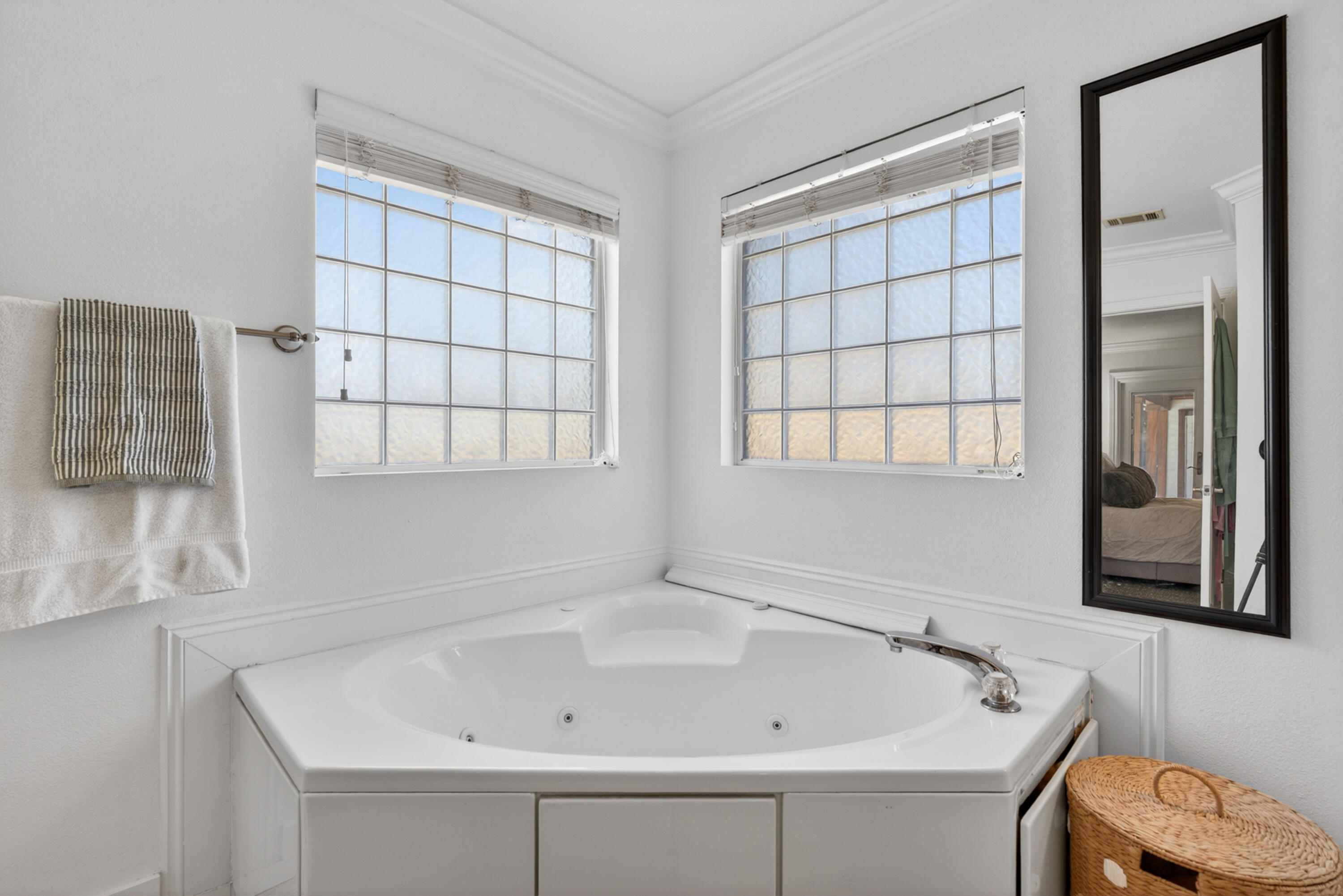 209 Santa Barbara Avenue Santa Rosa Beach, FL 32459 - Photo 37 of 78 a bathroom with a bathtub and a window