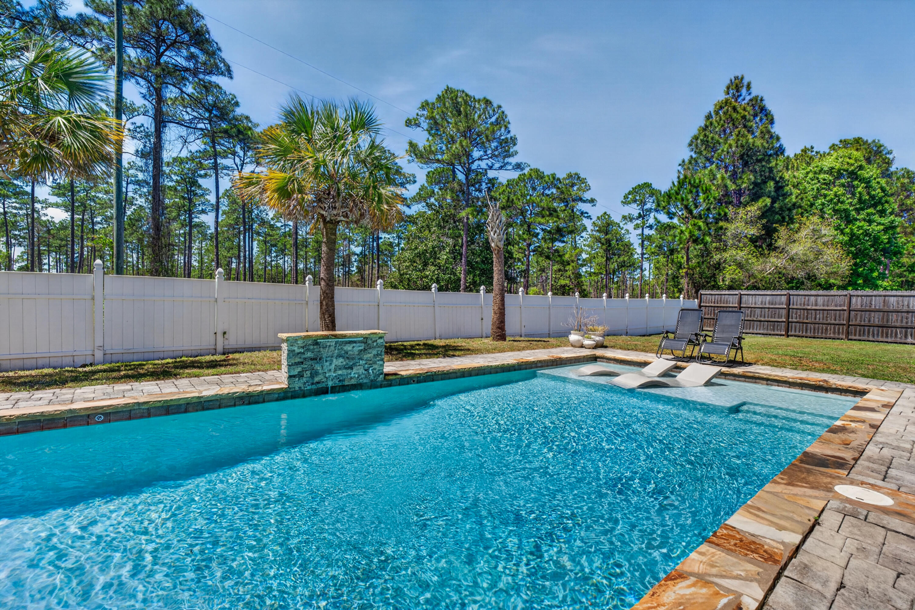 209 Santa Barbara Avenue Santa Rosa Beach, FL 32459 - Photo 43 of 78 a view of swimming pool with garden and trees