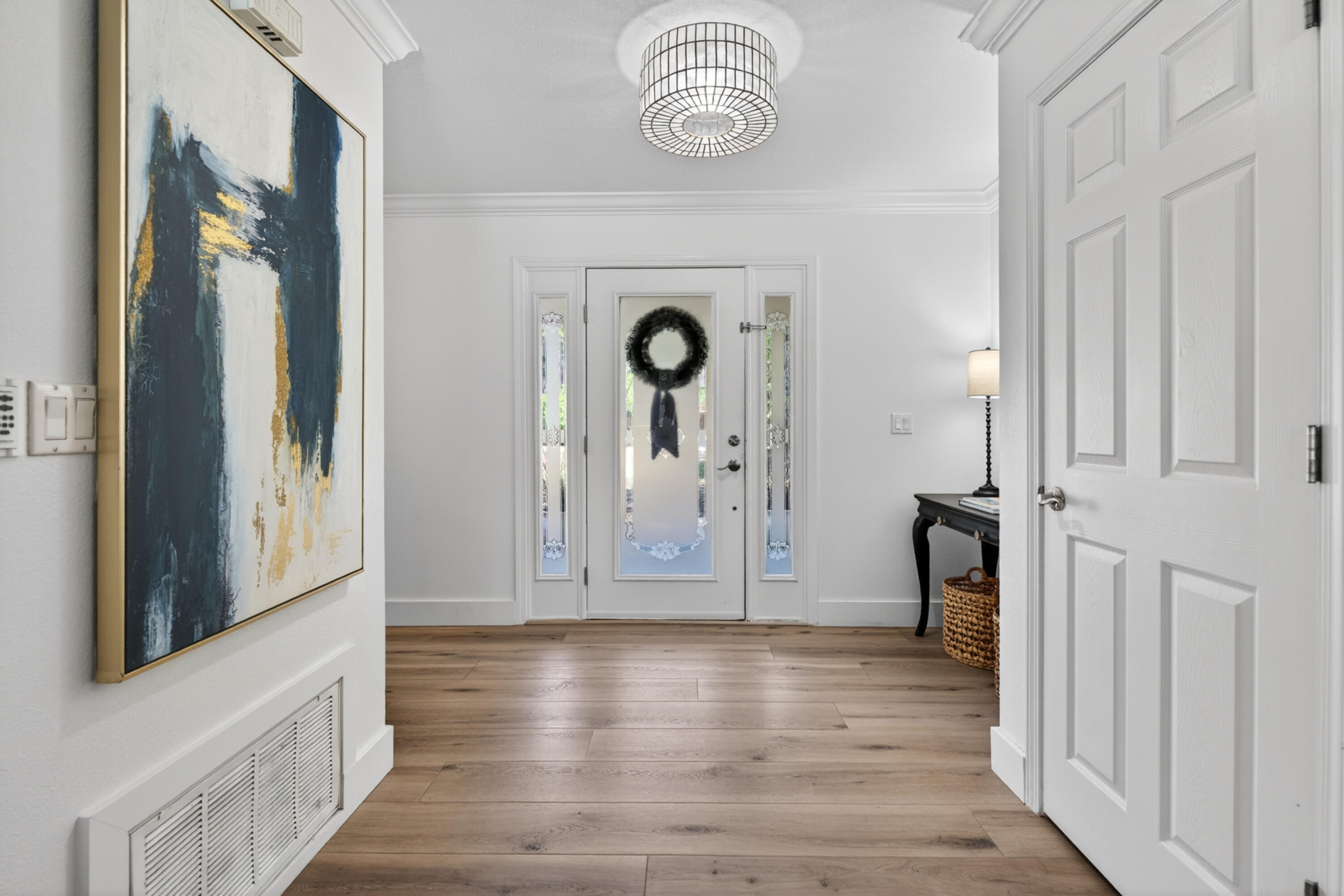 209 Santa Barbara Avenue Santa Rosa Beach, FL 32459 - Photo 5 of 78 a view of an entryway with wooden floor