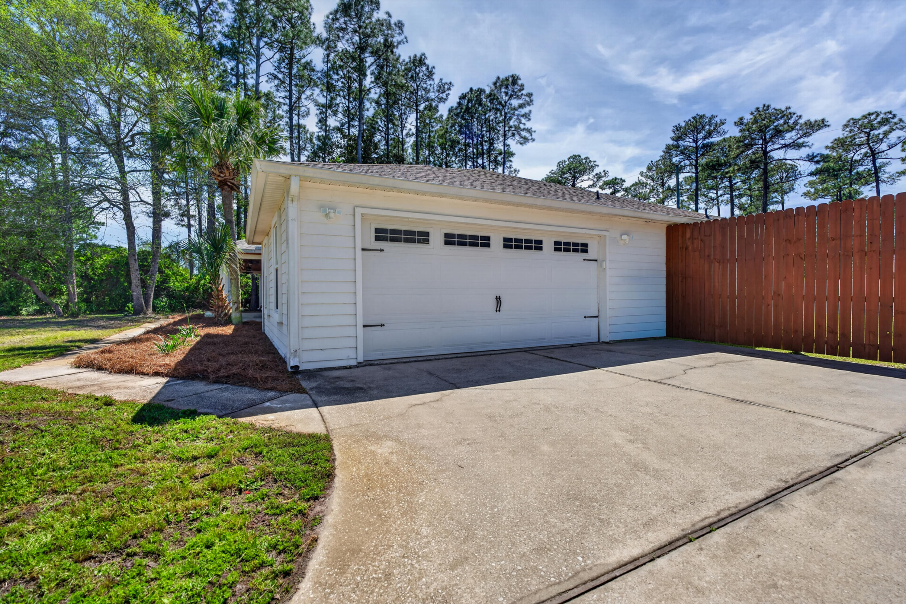 209 Santa Barbara Avenue Santa Rosa Beach, FL 32459 - Photo 57 of 78 a view of a house with a yard