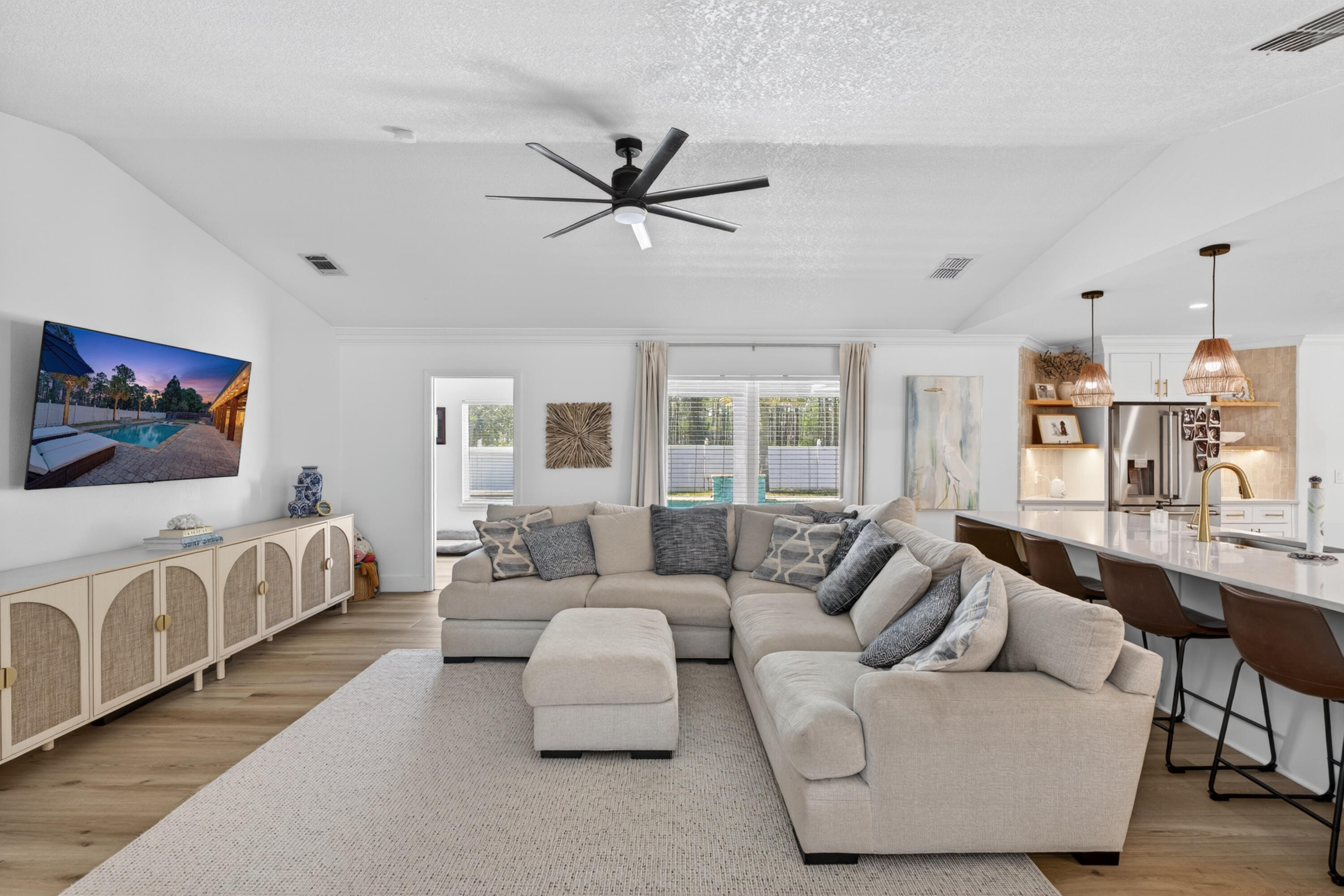 209 Santa Barbara Avenue Santa Rosa Beach, FL 32459 - Photo 6 of 78 a living room with furniture and a large window