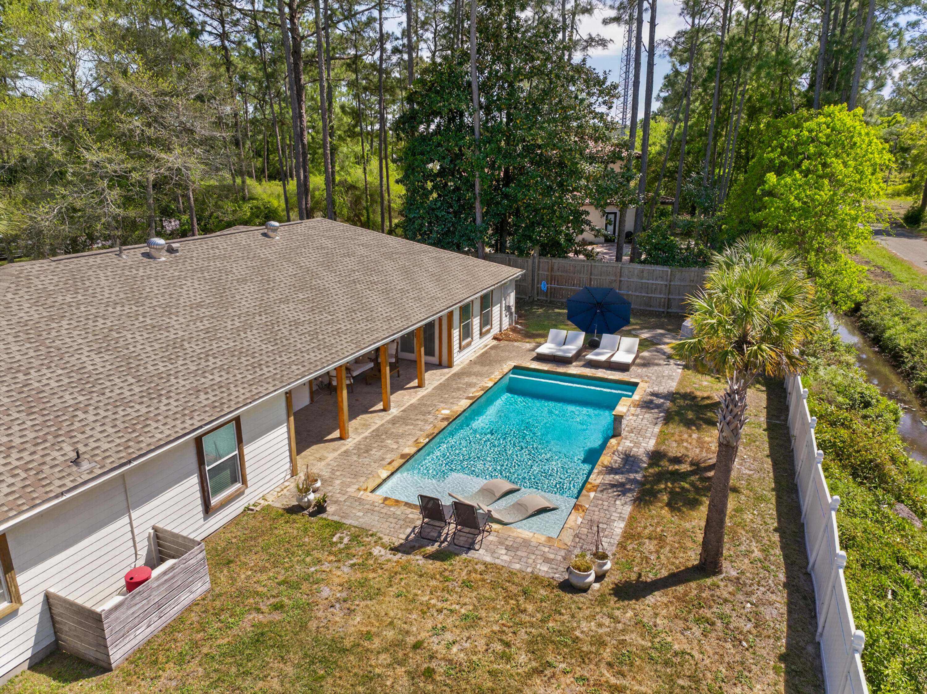 209 Santa Barbara Avenue Santa Rosa Beach, FL 32459 - Photo 70 of 78 an aerial view of a house with a yard