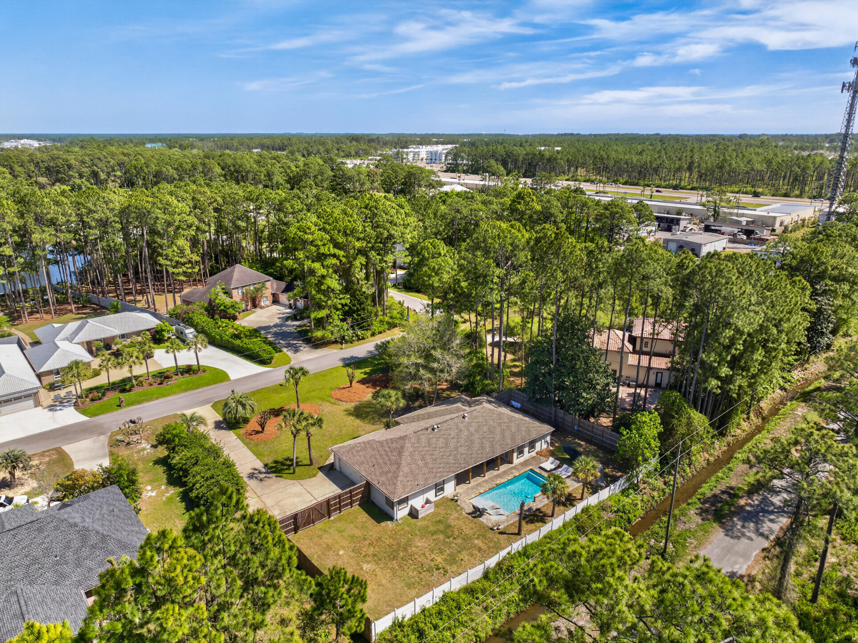 209 Santa Barbara Avenue Santa Rosa Beach, FL 32459 - Photo 74 of 78 an aerial view of residential houses with outdoor space and trees