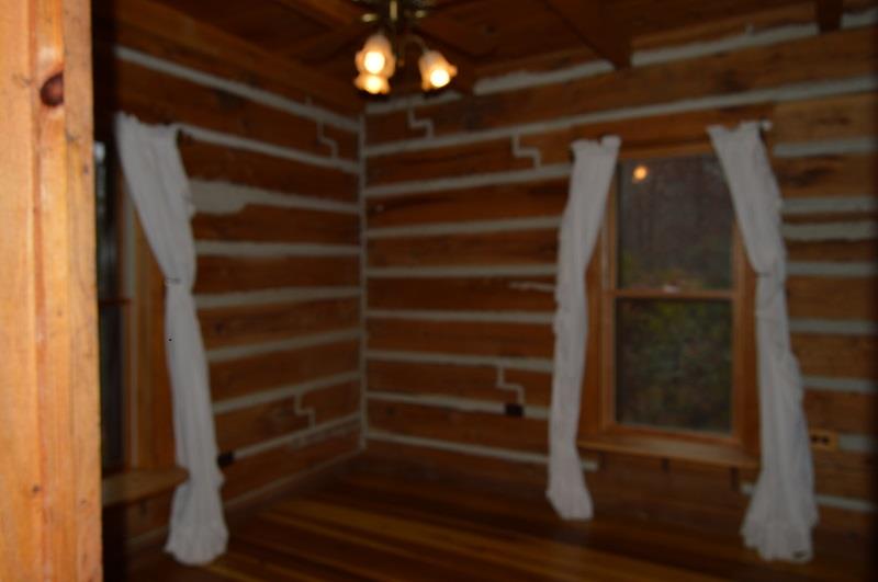 390 Ed Sanders Road Lynchburg, TN 37352 - Photo 5 of 11 a view of walk in closet with empty racks
