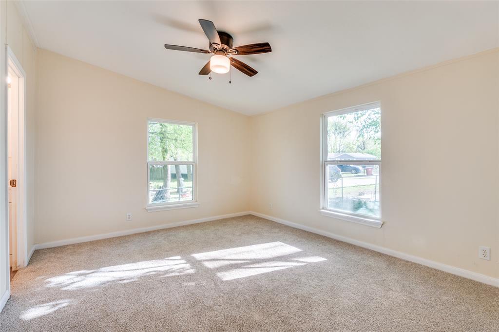 312 Oak Street Blue Ridge, TX 75424 - Photo 11 of 20 a view of an empty room with a window