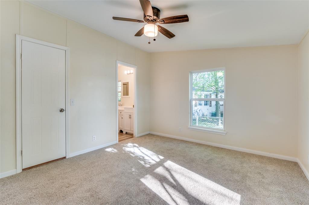 312 Oak Street Blue Ridge, TX 75424 - Photo 12 of 20 a view of a livingroom with a window and a ceiling fan