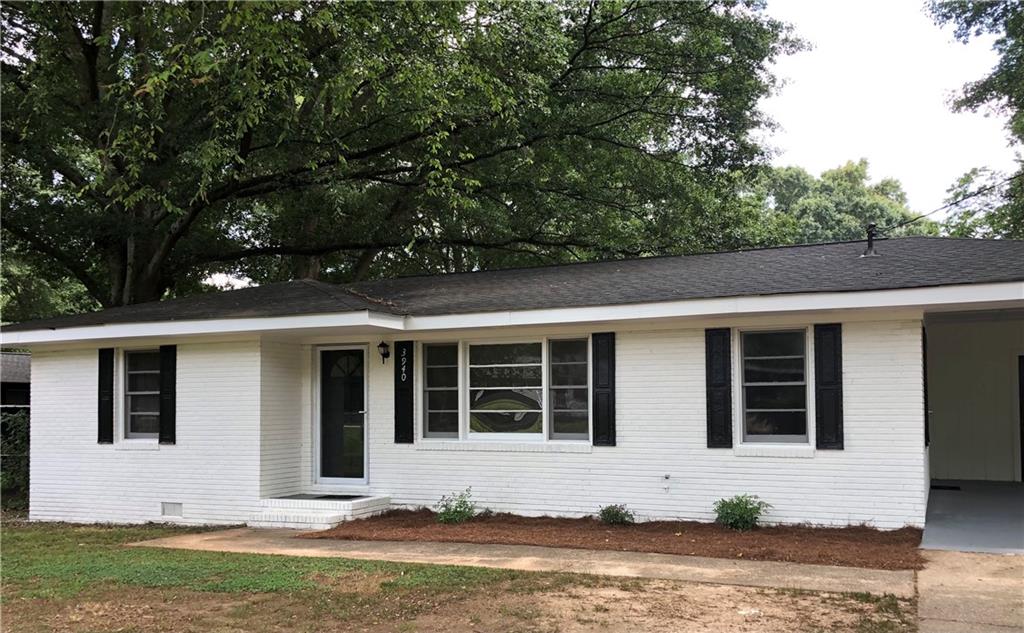 3940 Oglesby Road Powder Springs, GA 30127 - Photo 1 of 1 front view of house with yard