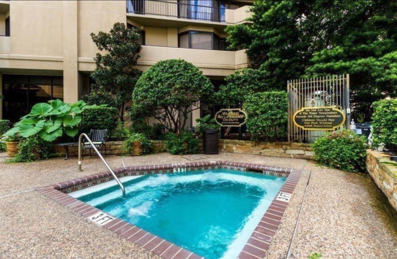 3350 McCue Road, Unit 1901 Houston, TX 77056 - Photo 26 of 29 a front view of a house with a yard