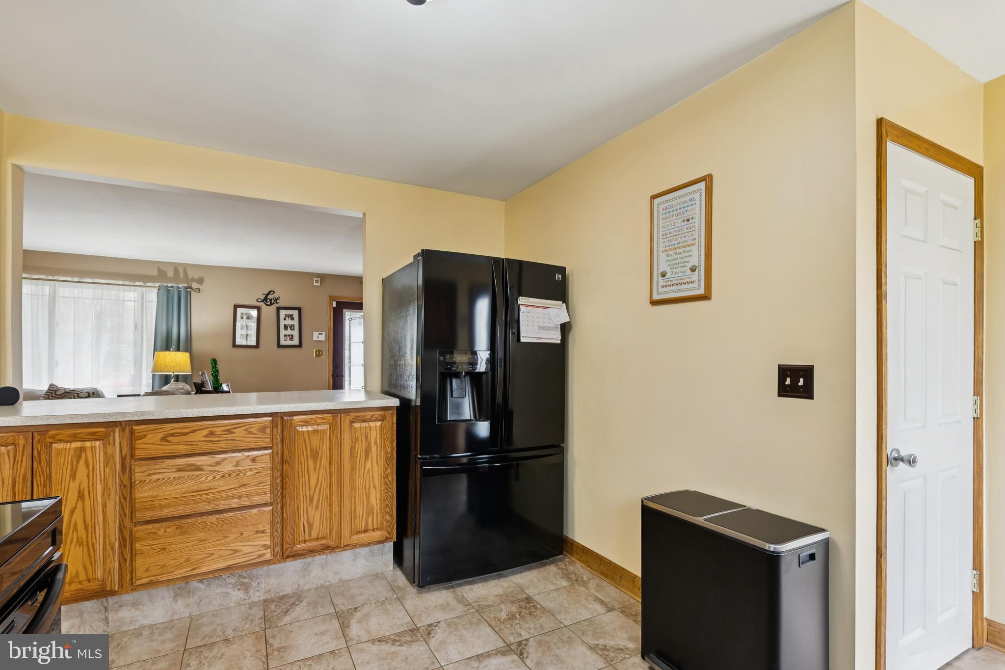 60 Spaulding Drive Monroeville, NJ 08343 - Photo 11 of 26 a kitchen with a refrigerator and a sink
