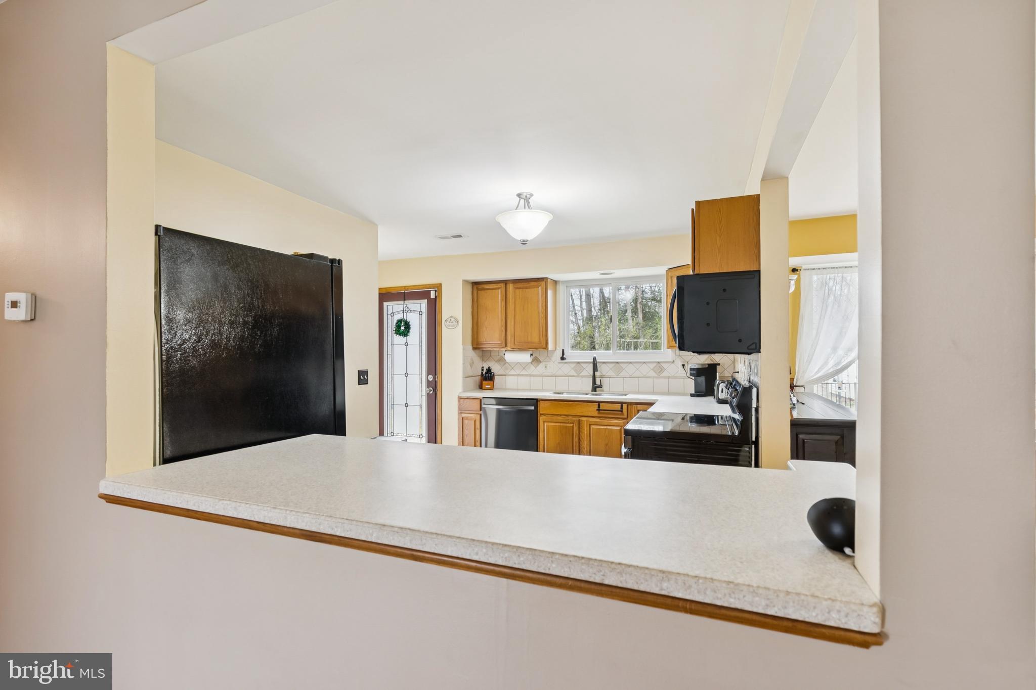 60 Spaulding Drive Monroeville, NJ 08343 - Photo 12 of 26 a living room with furniture and a flat screen tv