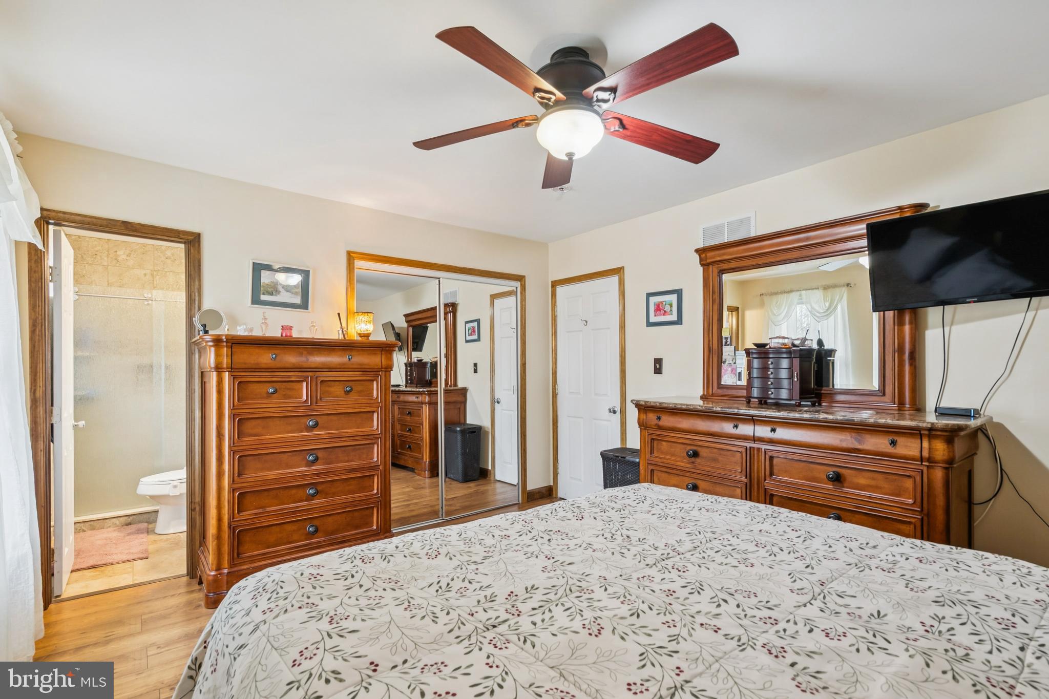 60 Spaulding Drive Monroeville, NJ 08343 - Photo 15 of 26 a bedroom with a bed and a dresser