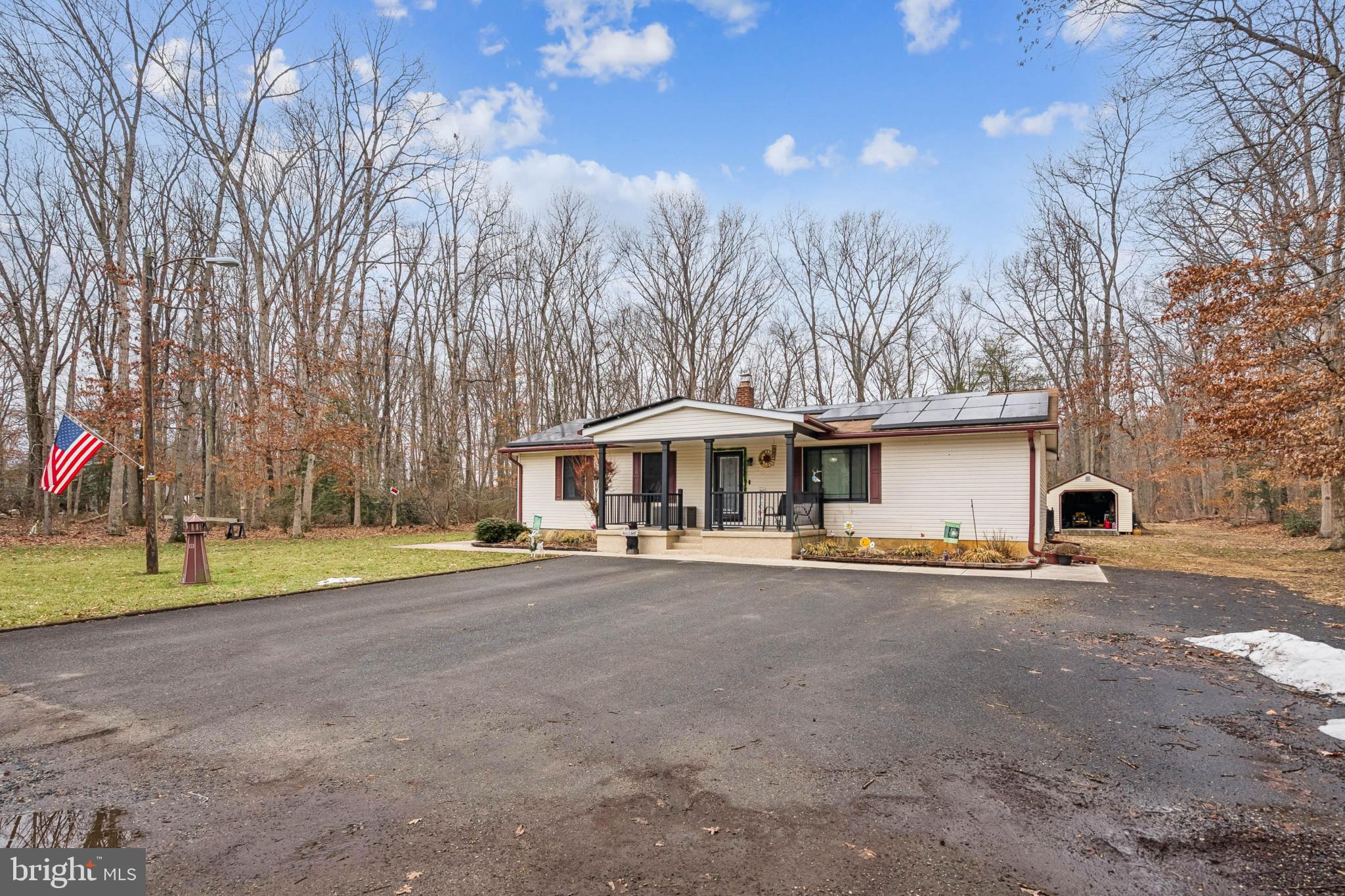 60 Spaulding Drive Monroeville, NJ 08343 - Photo 3 of 26 a view of a house with a yard and sitting area