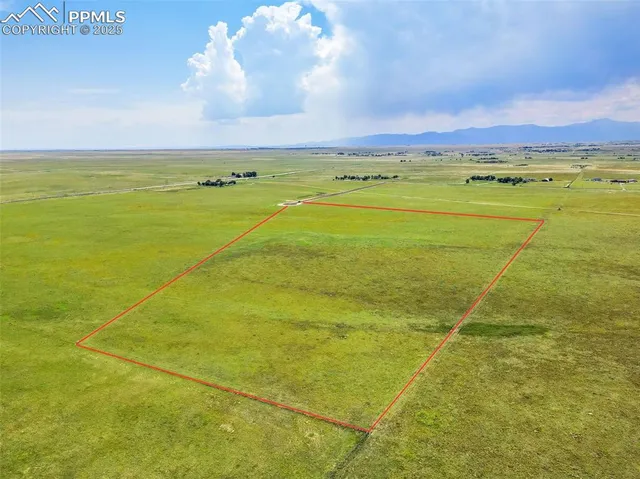 a view of an ocean and a houses