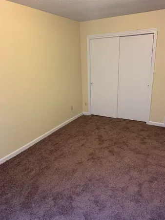 an empty room with closet