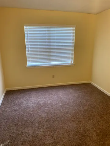 a view of a room with a window