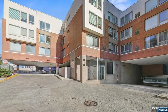 a view of a building with a street