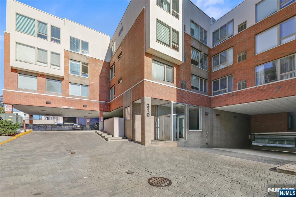 a view of a building with a street