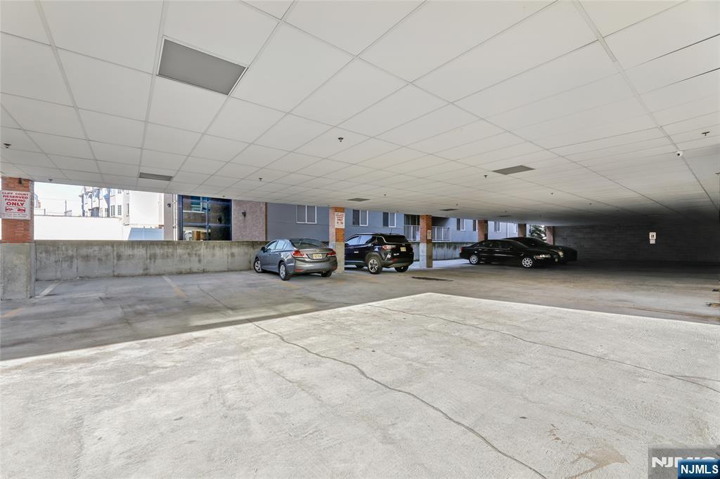 310 Cliff Lane, Unit 3C Cliffside Park, NJ 07010 - Photo 16 of 17 a car parked in parking area