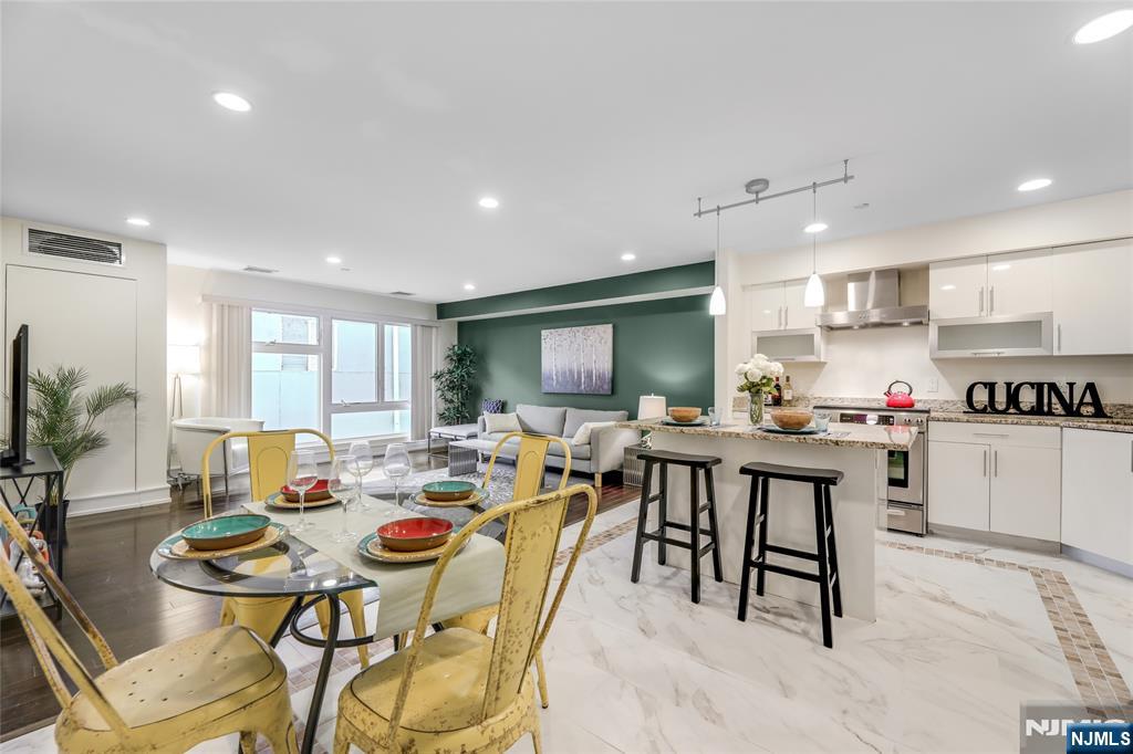 310 Cliff Lane, Unit 3C Cliffside Park, NJ 07010 - Photo 7 of 17 a view of a dining area with furniture