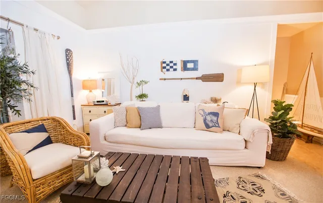 a living room with furniture and a couch