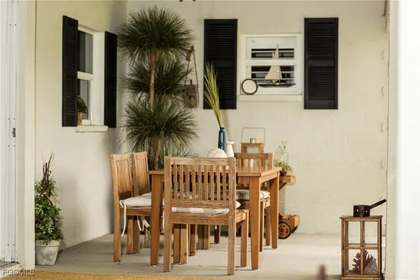 a view of a chairs and table in a kitchen