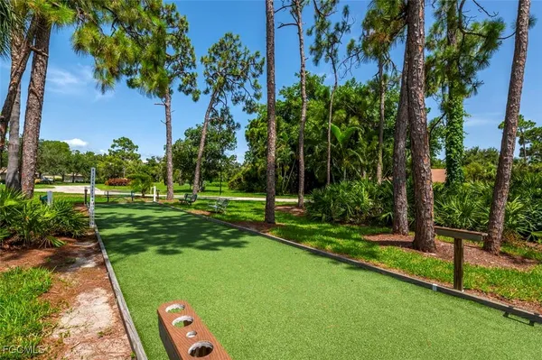 a view of a golf course with a lake