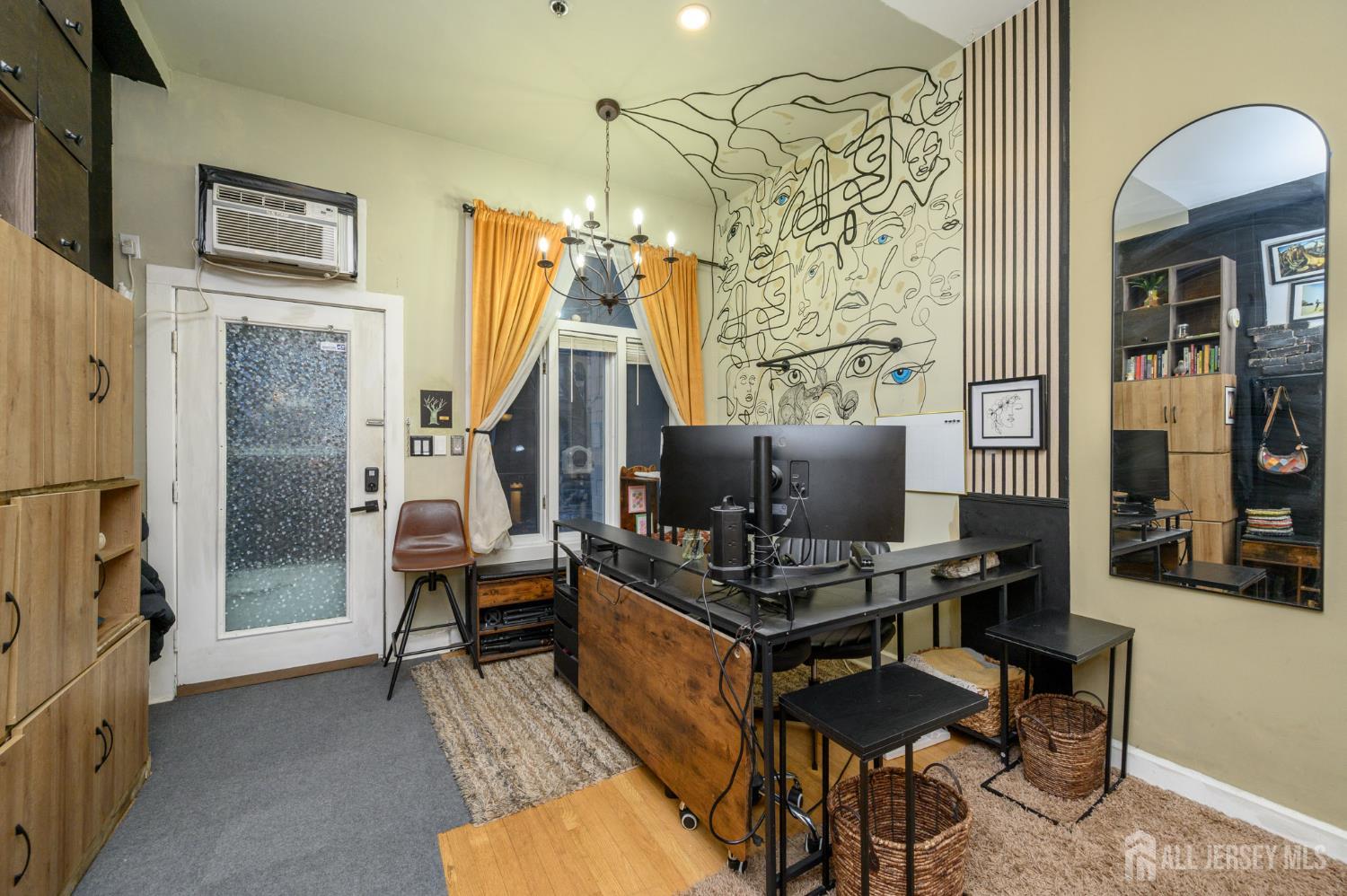 117 Clinton Street, Unit 1F Hoboken, NJ 07030 - Photo 9 of 24 a workspace with furniture and a window