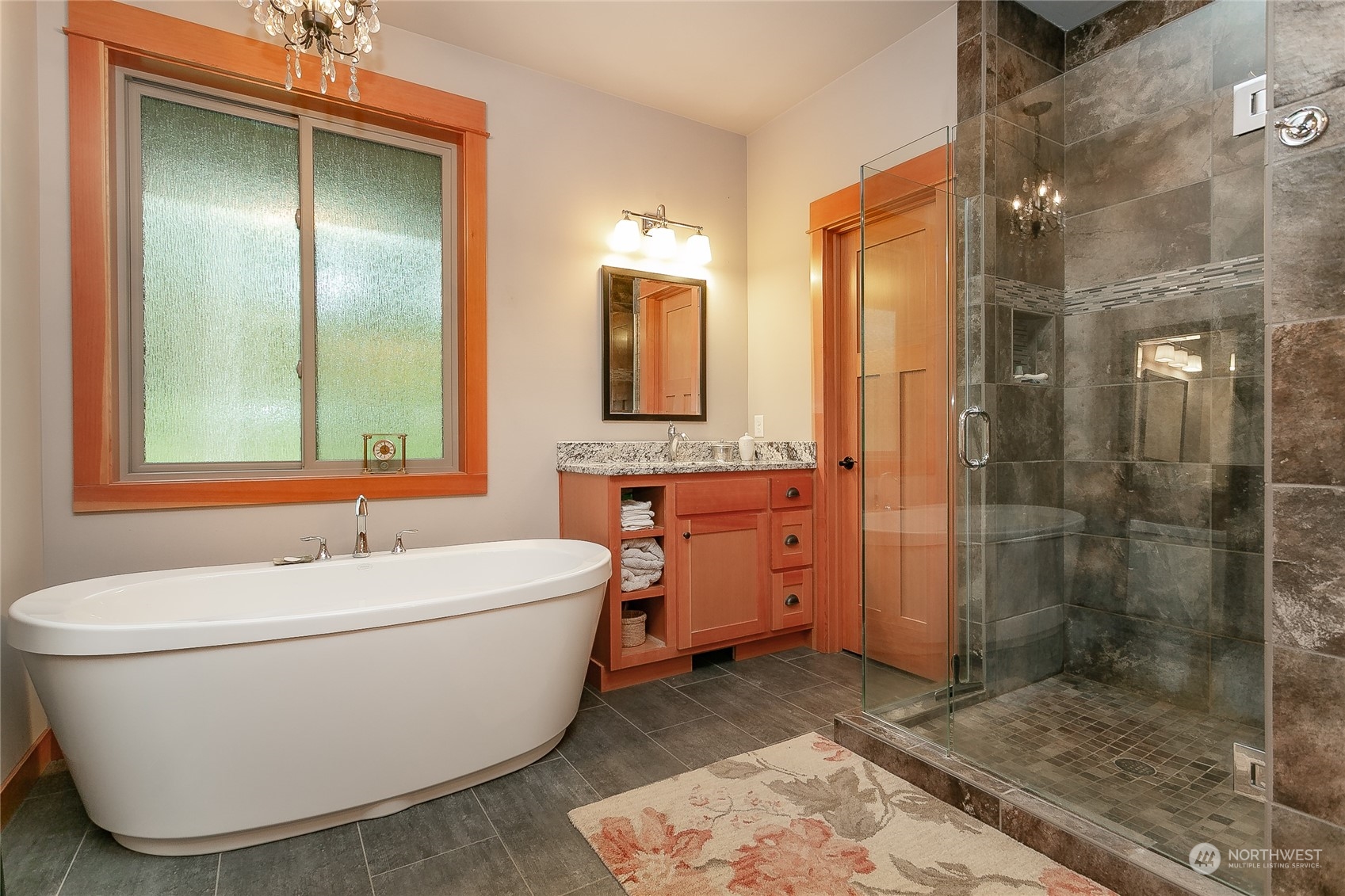 5487 Canvasback Road Blaine, WA 98230 - Photo 26 of 40 a bathroom with a bathtub and shower