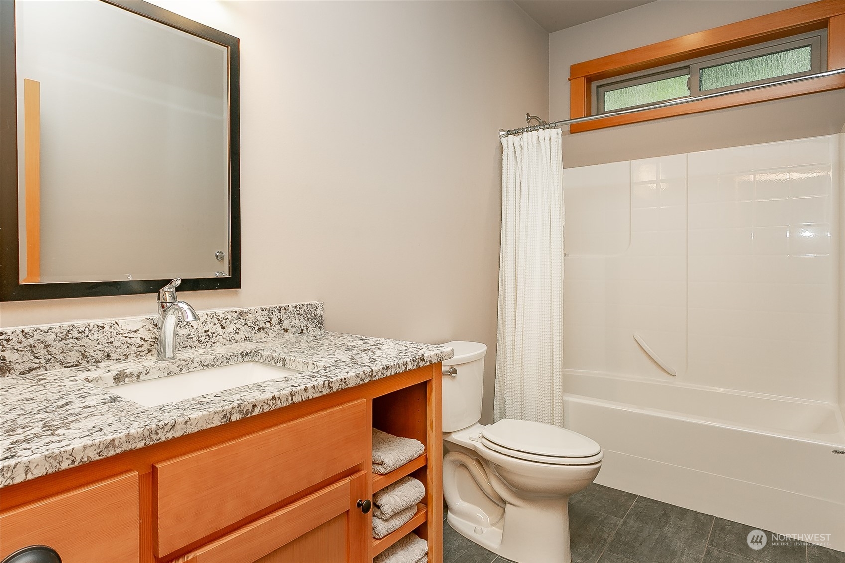 5487 Canvasback Road Blaine, WA 98230 - Photo 31 of 40 a bathroom with a granite countertop sink toilet and shower
