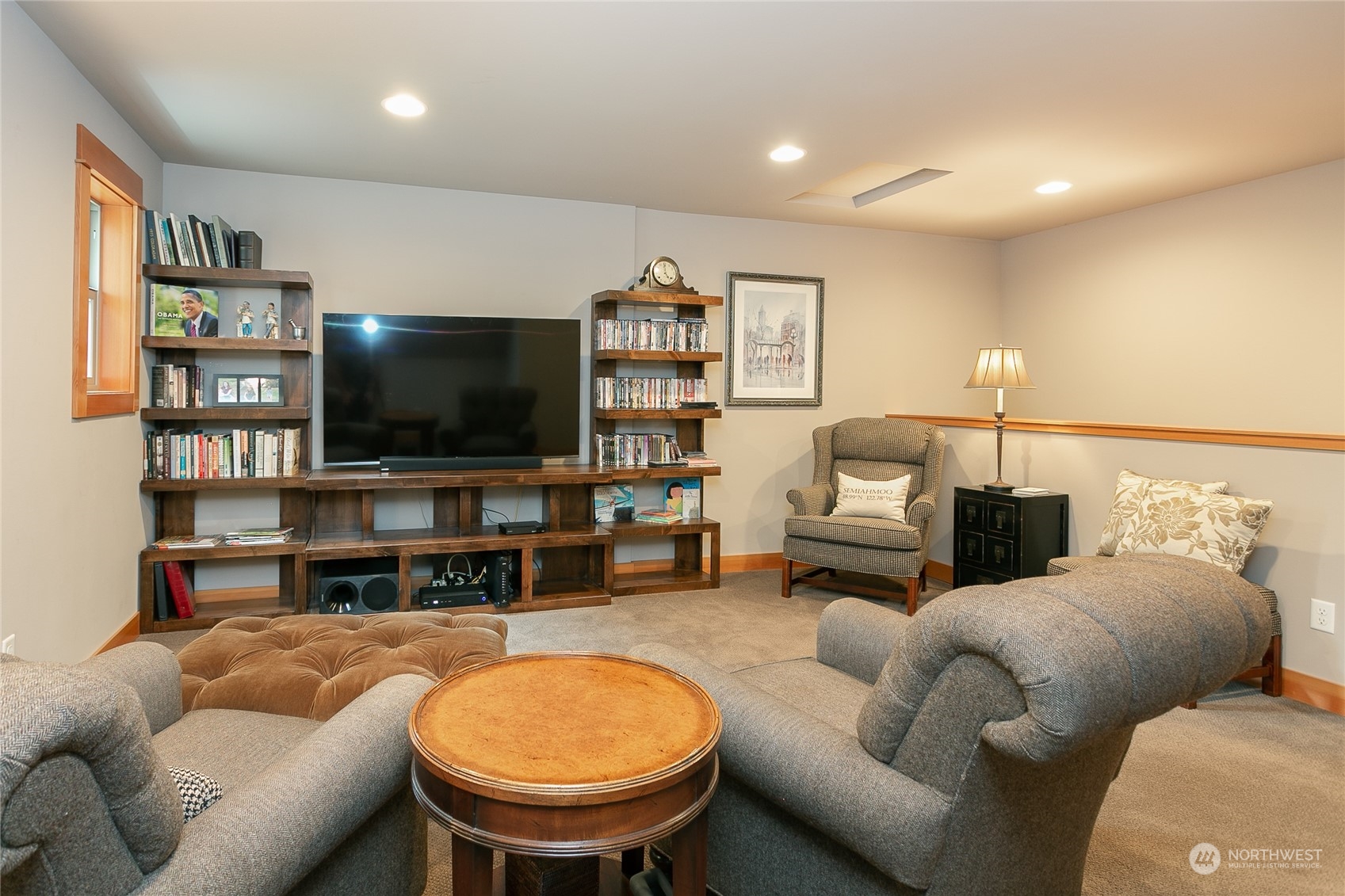5487 Canvasback Road Blaine, WA 98230 - Photo 32 of 40 a living room with furniture and a flat screen tv