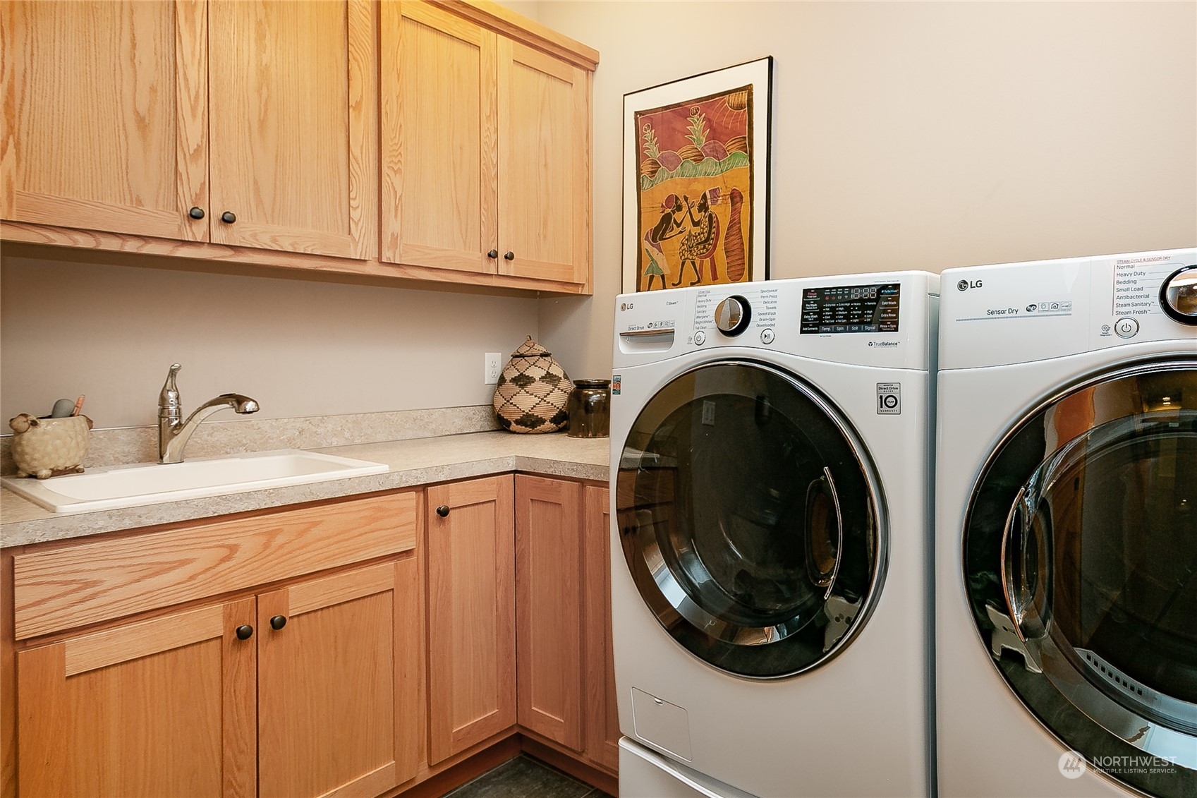 5487 Canvasback Road Blaine, WA 98230 - Photo 36 of 40 a utility room with dryer and washer