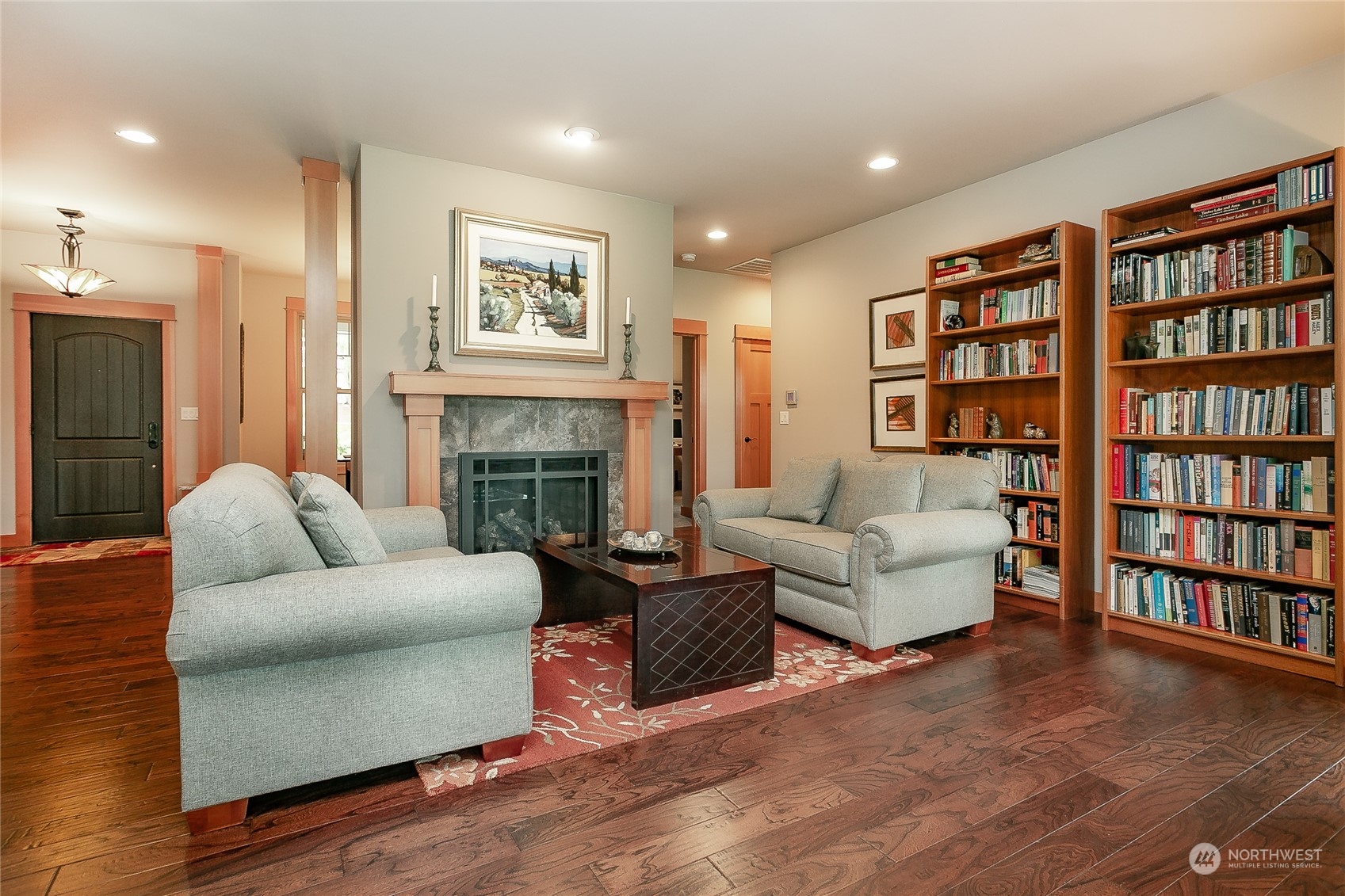 5487 Canvasback Road Blaine, WA 98230 - Photo 10 of 40 a living room with furniture and a fireplace
