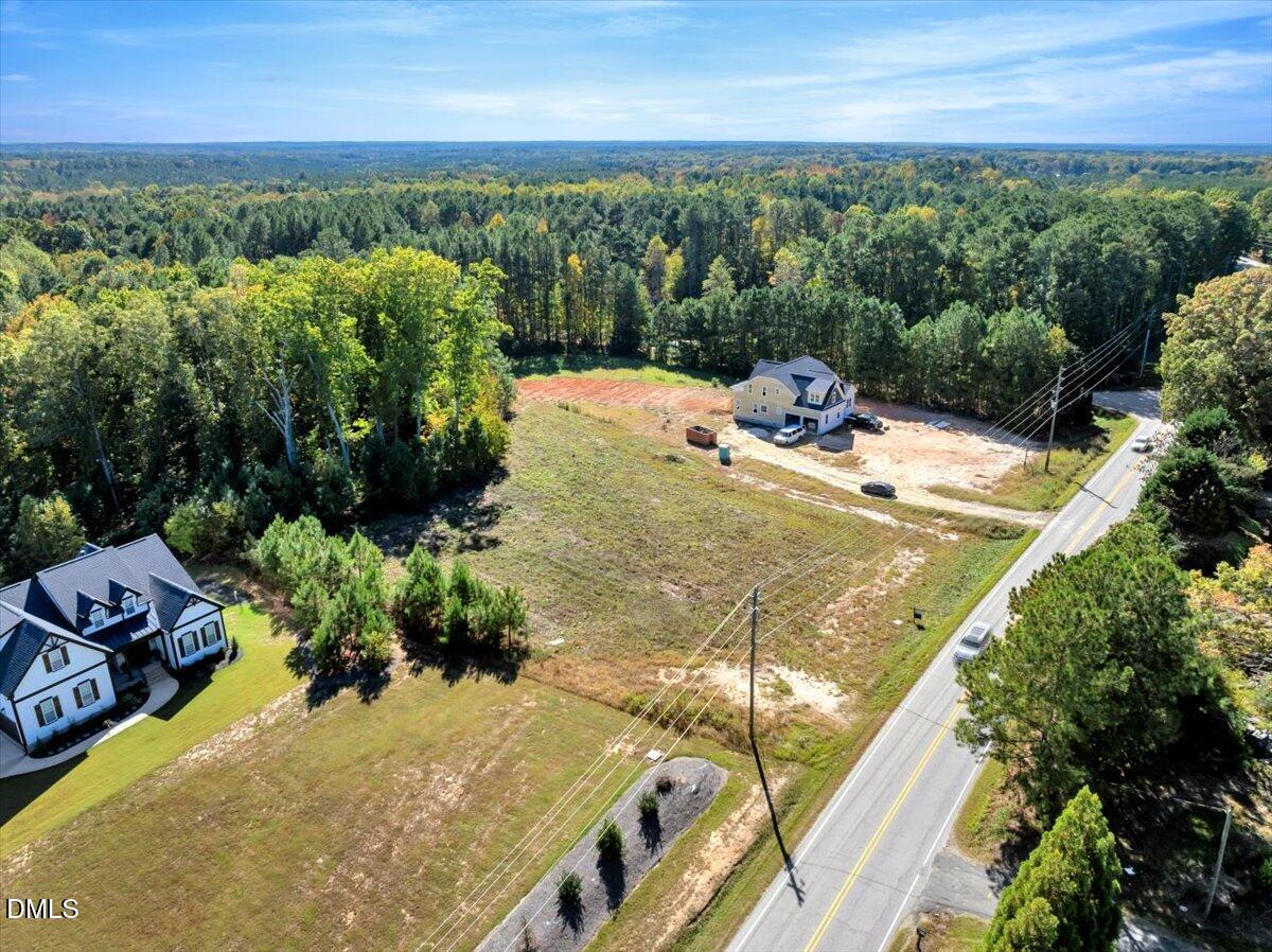 3210 Bruce Garner Road Creedmoor, NC 27522 - Photo 3 of 11 a view of a backyard with sitting area