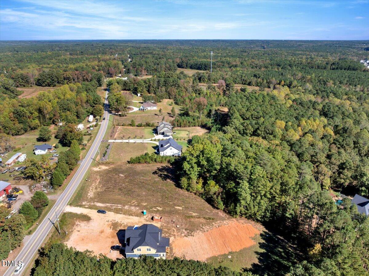 3210 Bruce Garner Road Creedmoor, NC 27522 - Photo 6 of 11 an aerial view of residential houses with outdoor space