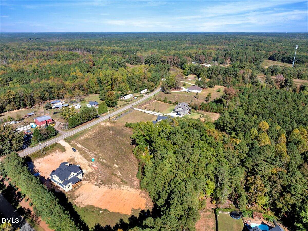 3210 Bruce Garner Road Creedmoor, NC 27522 - Photo 7 of 11 an aerial view of residential houses with outdoor space
