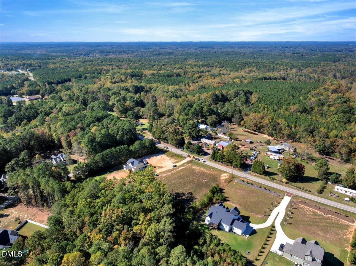 3210 Bruce Garner Road Creedmoor, NC 27522 - Photo 9 of 11 an aerial view of multiple house