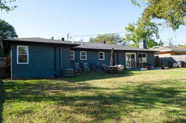 a view of a house with a swimming pool