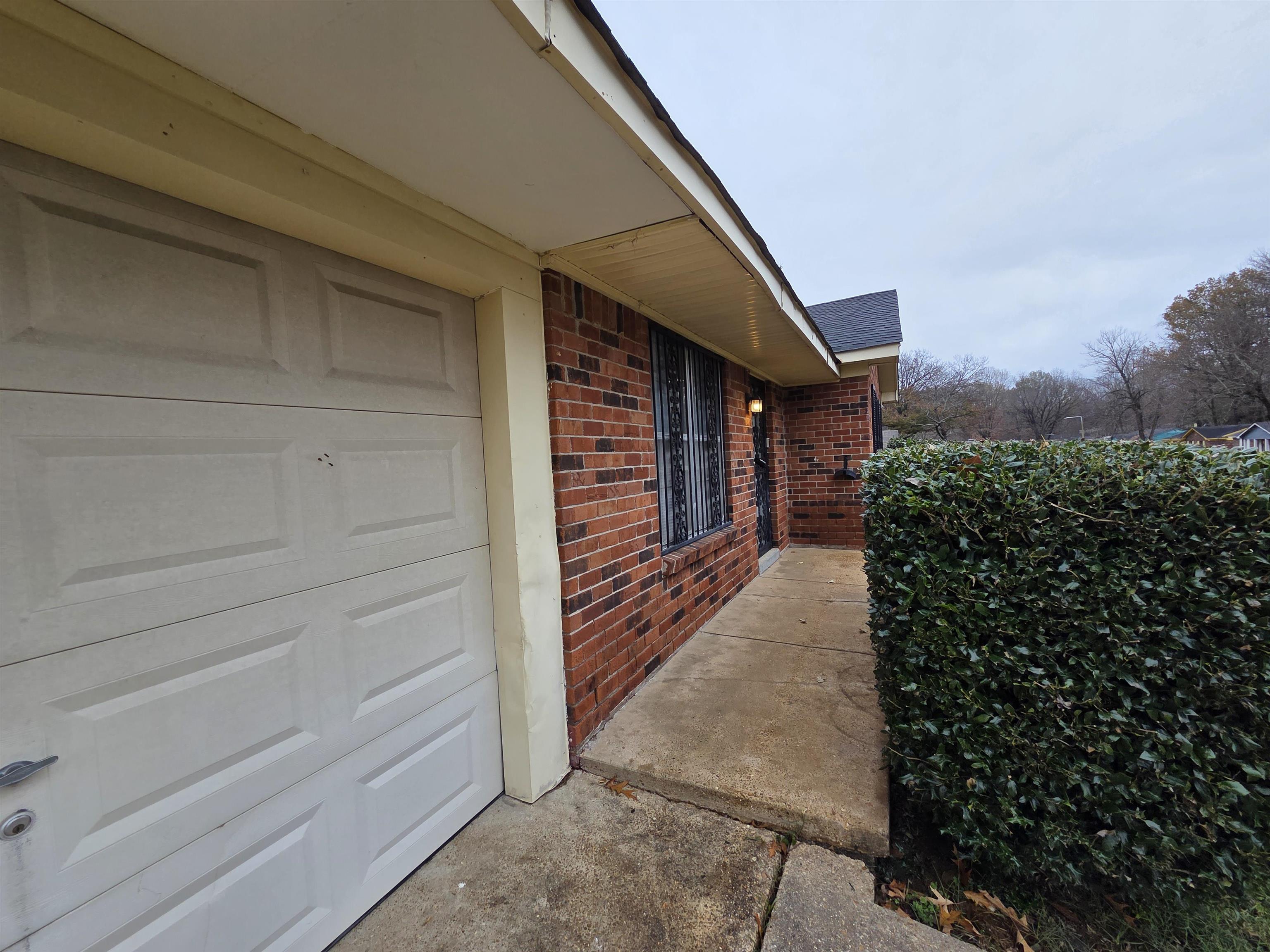 2192 Lisa Avenue Memphis, TN 38127 - Photo 21 of 21 a view of a pathway along the building