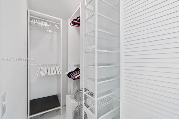 a view of a room with rack on the wall