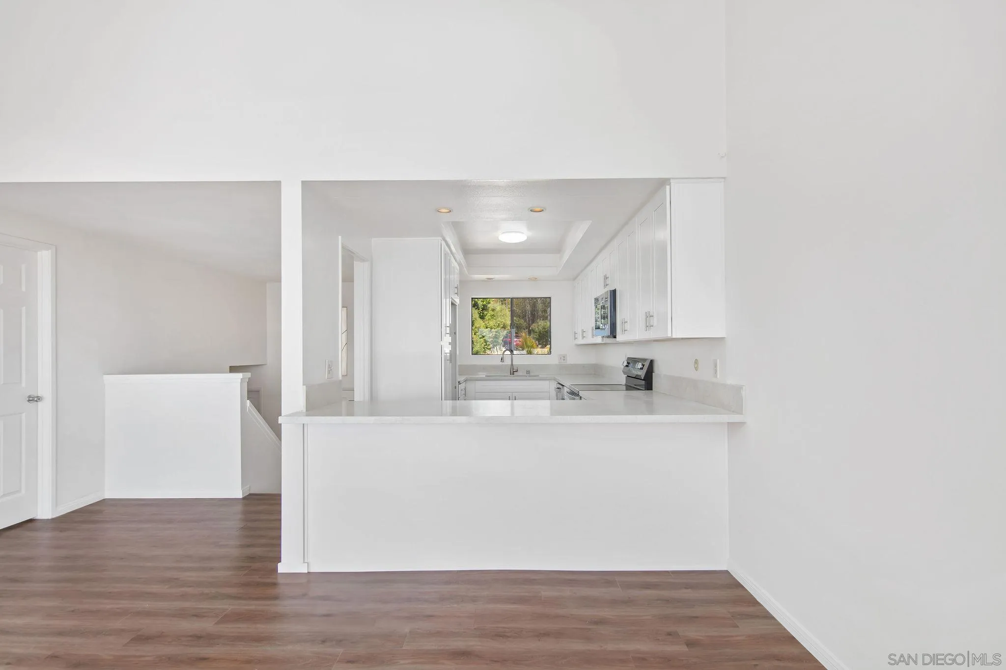 1957 Outrigger Way Oceanside, CA 92054 - Photo 11 of 32 a view of kitchen with wooden floor